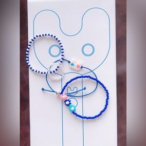 New jeans them bracelets and a ring set